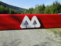M&B Symbol On Gate.